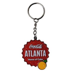 NWOT The Coca-Cola Atlanta Home of Coke Key Chain Red Glitter